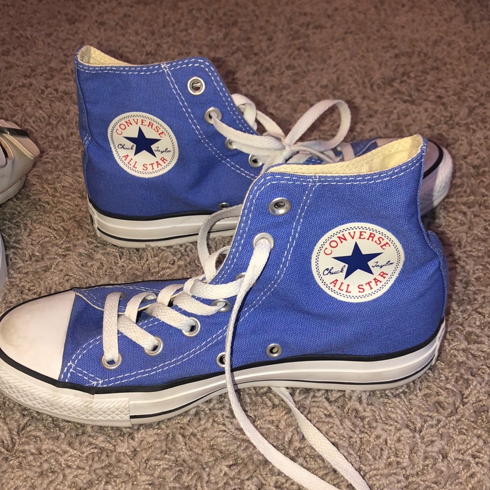 Purplish blue converse high tops